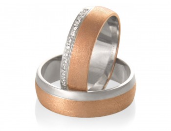 Poročna prstana iz belega, kromiranega in rdečega zlata.