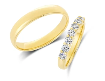 Poročna prstana iz rumenega zlata in z briljanti, ki so malo dvignjeni, št. 438